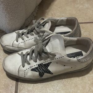 Golden Goose White Sneakers with Black Star Accent